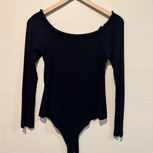 Bodysuit with ruffle detailing